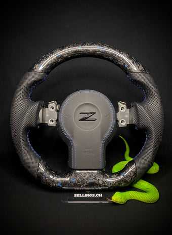 compare product Nissan 350z Volant sport Forged Carbon Éclats de couleur